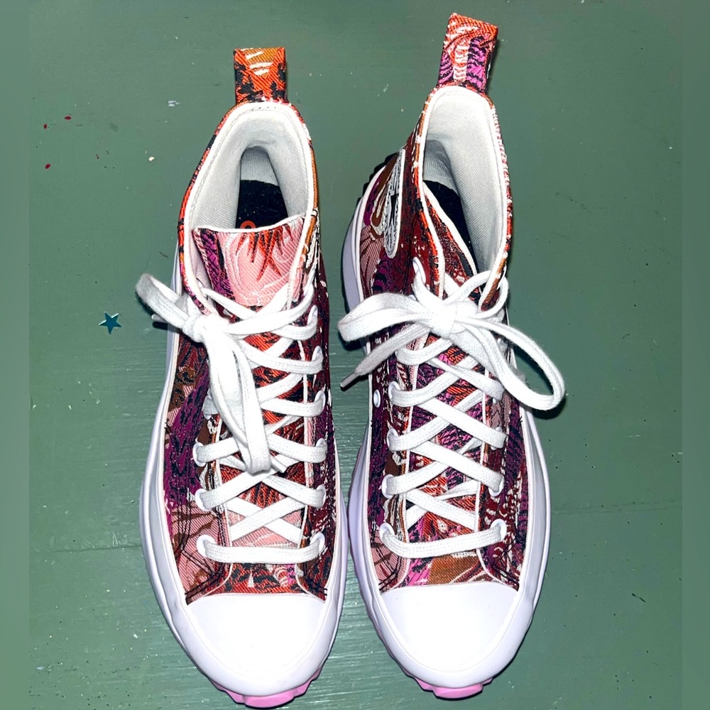 Platform pink, black, and red Converse women’s size 7.5.